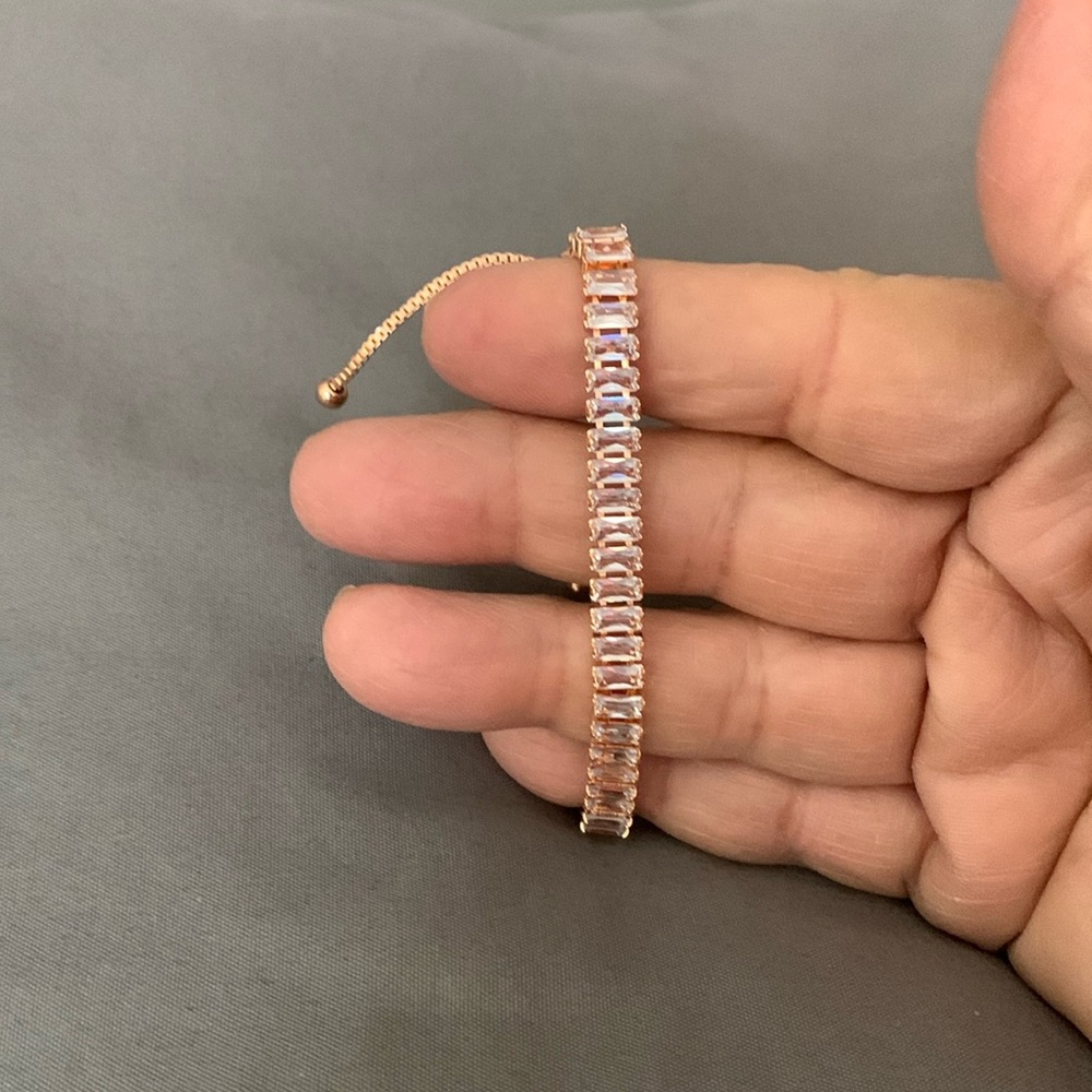 Gold with clear rinestones.